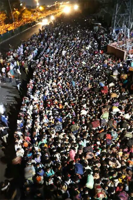 COVID-19 - Migrant Workers Queue At Delhi Bus Terminals To Leave For Home (See pictures)

