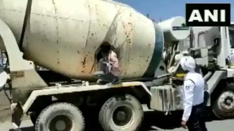 18 men caught travelling in concrete mixer truck in MP's Indore