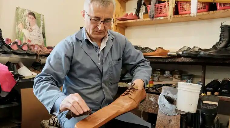 Romanian shoe-maker designs long-nose footwear to help people maintain social distancing