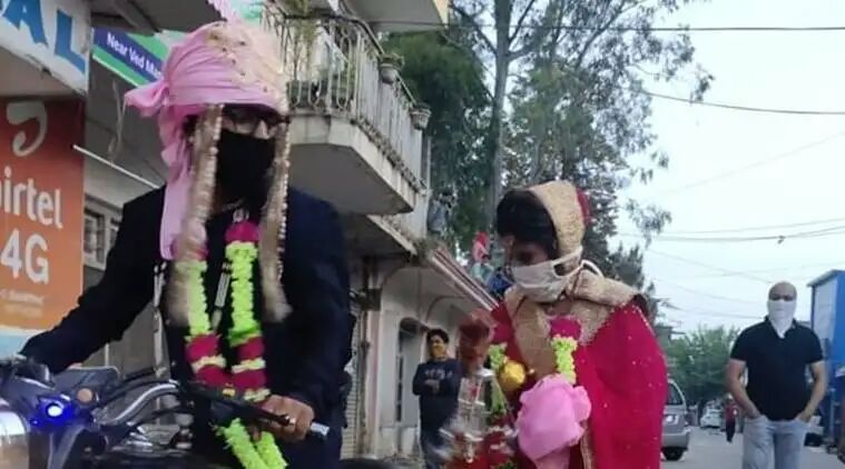 Abandoning lavish wedding plans, couple ties knot in J&K temple amid lockdown

